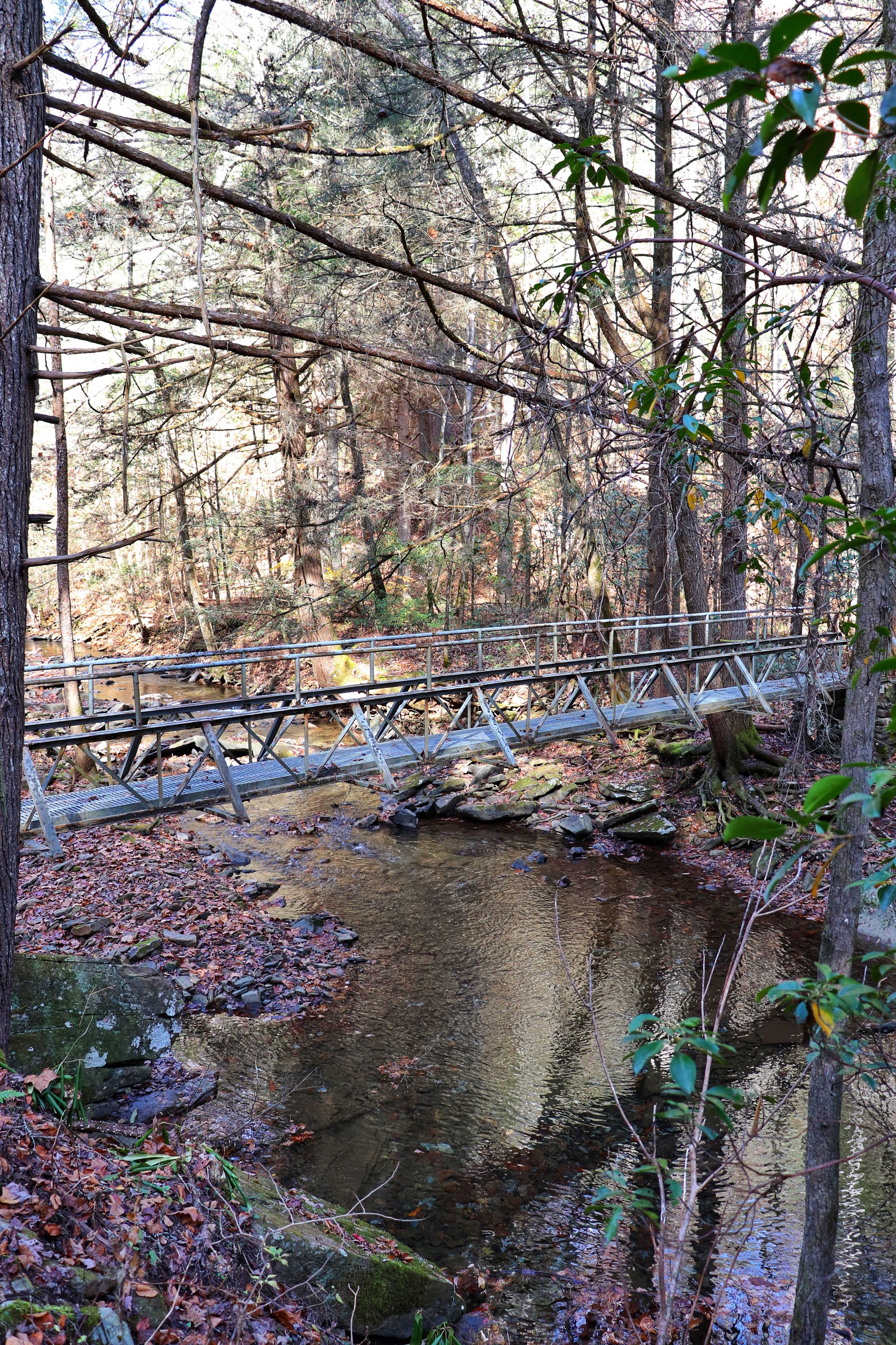 metal bridge over a creek on the Cumberland Trail