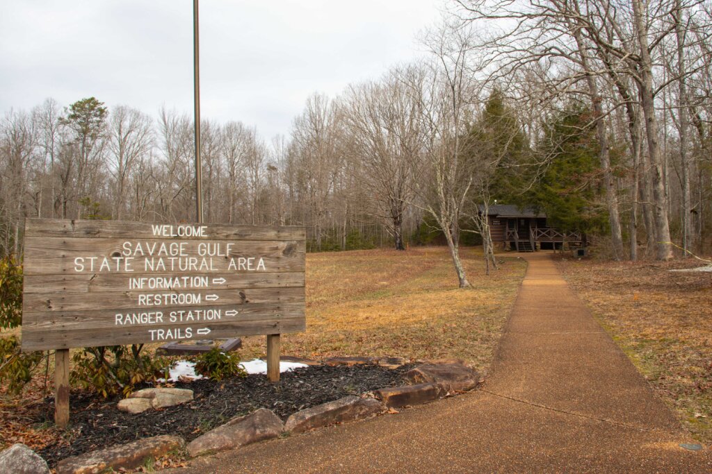 savage gulf east trailhead welcome sign for savage gulf state natural area showing the location of information, restroom, ranger station, and trails